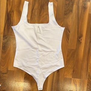 Abercrombie and Fitch white thong bodysuit‎ size large front detail snap crotch
